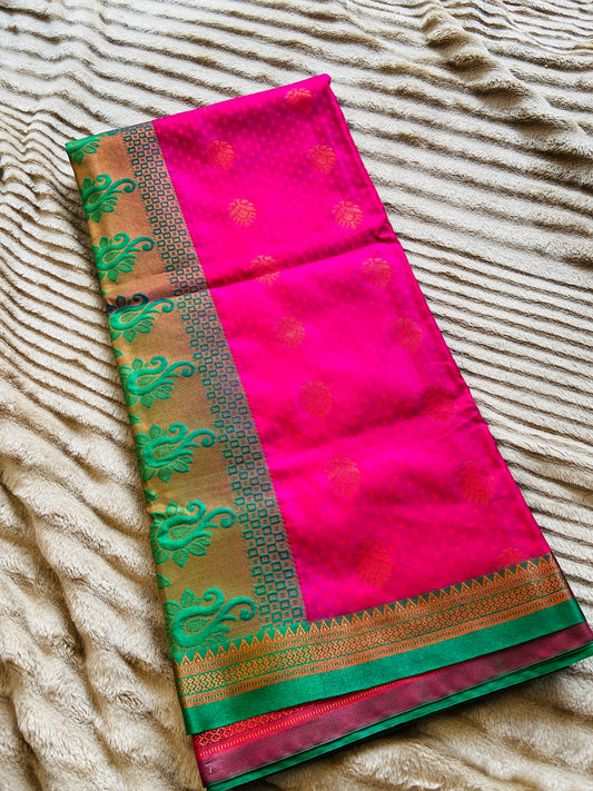 Trisha silk sare from yeola with the combination of Pink and Green Saroj the label