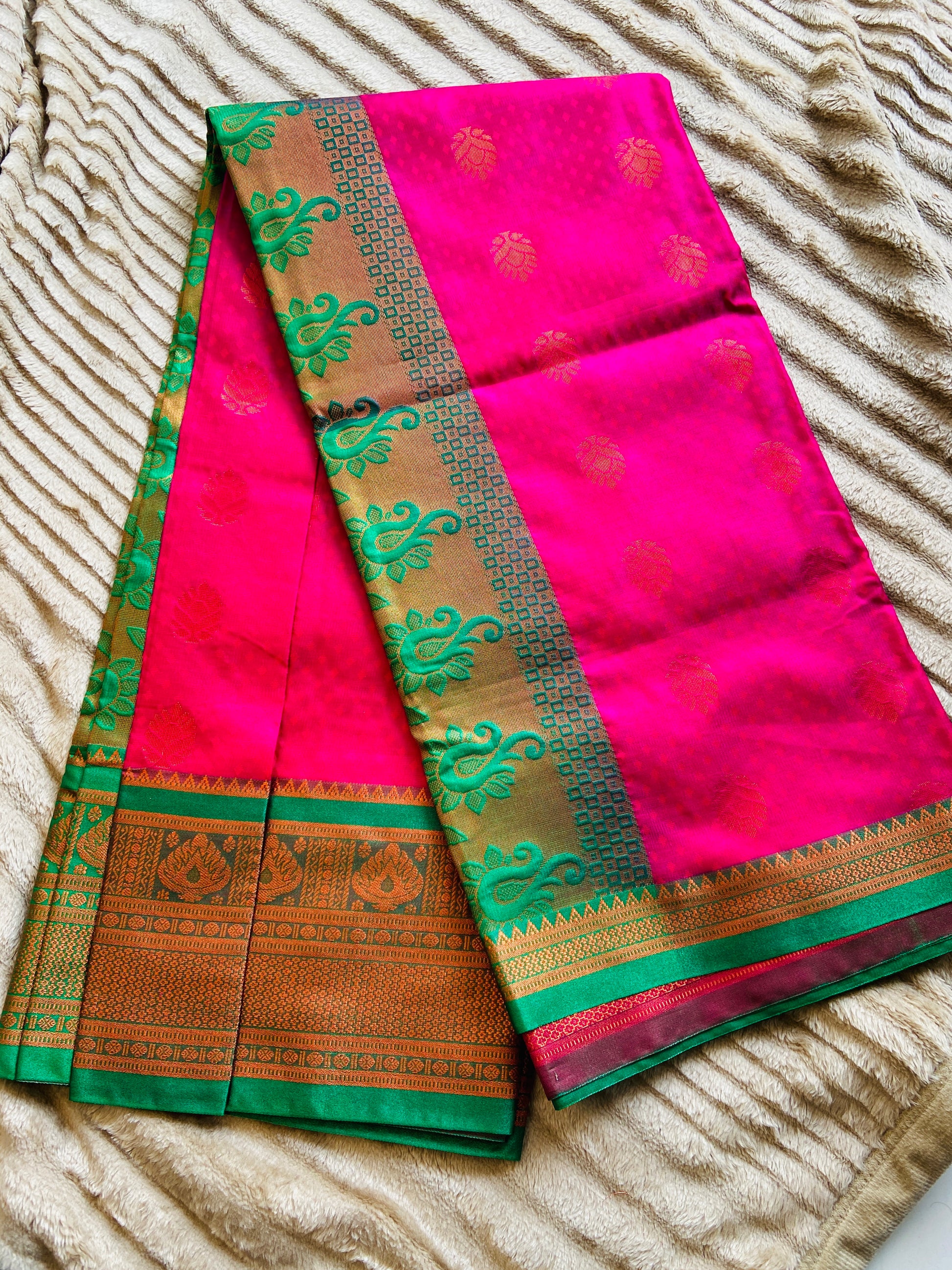 Trisha silk sare from yeola with the combination of Pink and Green Saroj the label